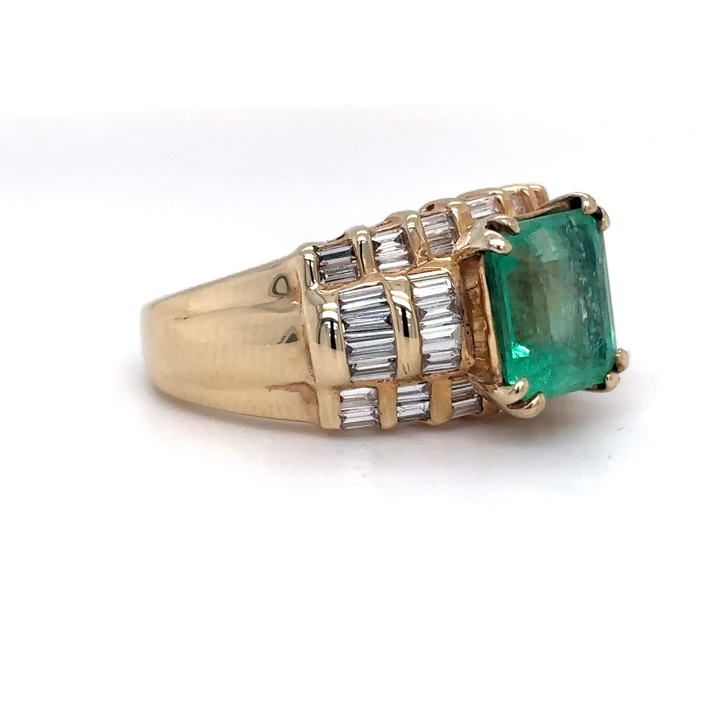 14KY 3.95CTW EMERALD-BAGUETTE DIAMOND RING