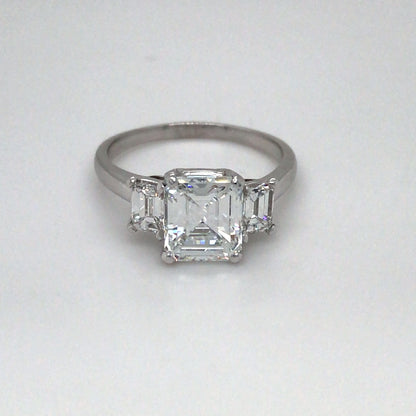 PLAT 2.67CTW EMERALD CUT THREE STONE DIAMOND ENGAGEMENT RING