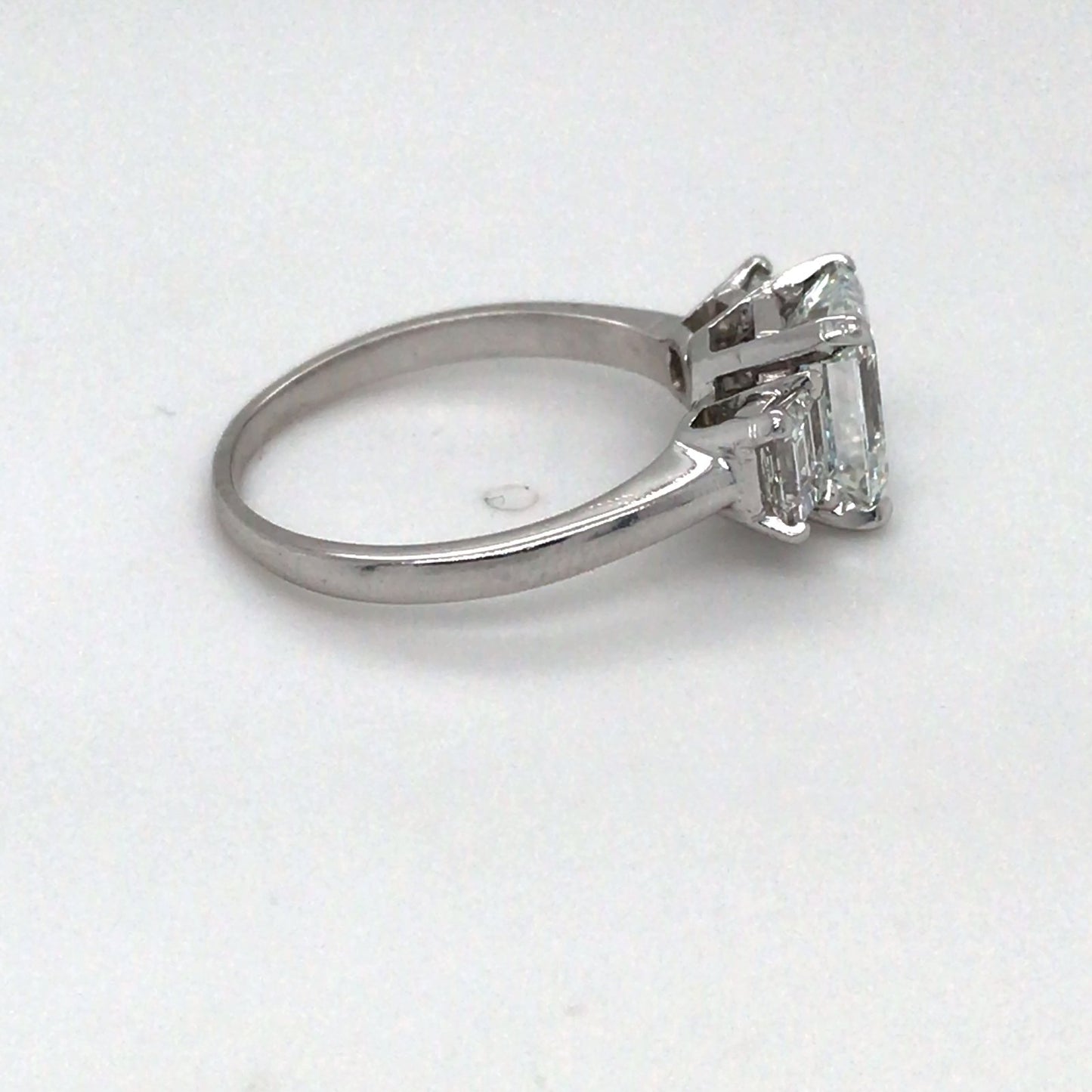 PLAT 2.67CTW EMERALD CUT THREE STONE DIAMOND ENGAGEMENT RING
