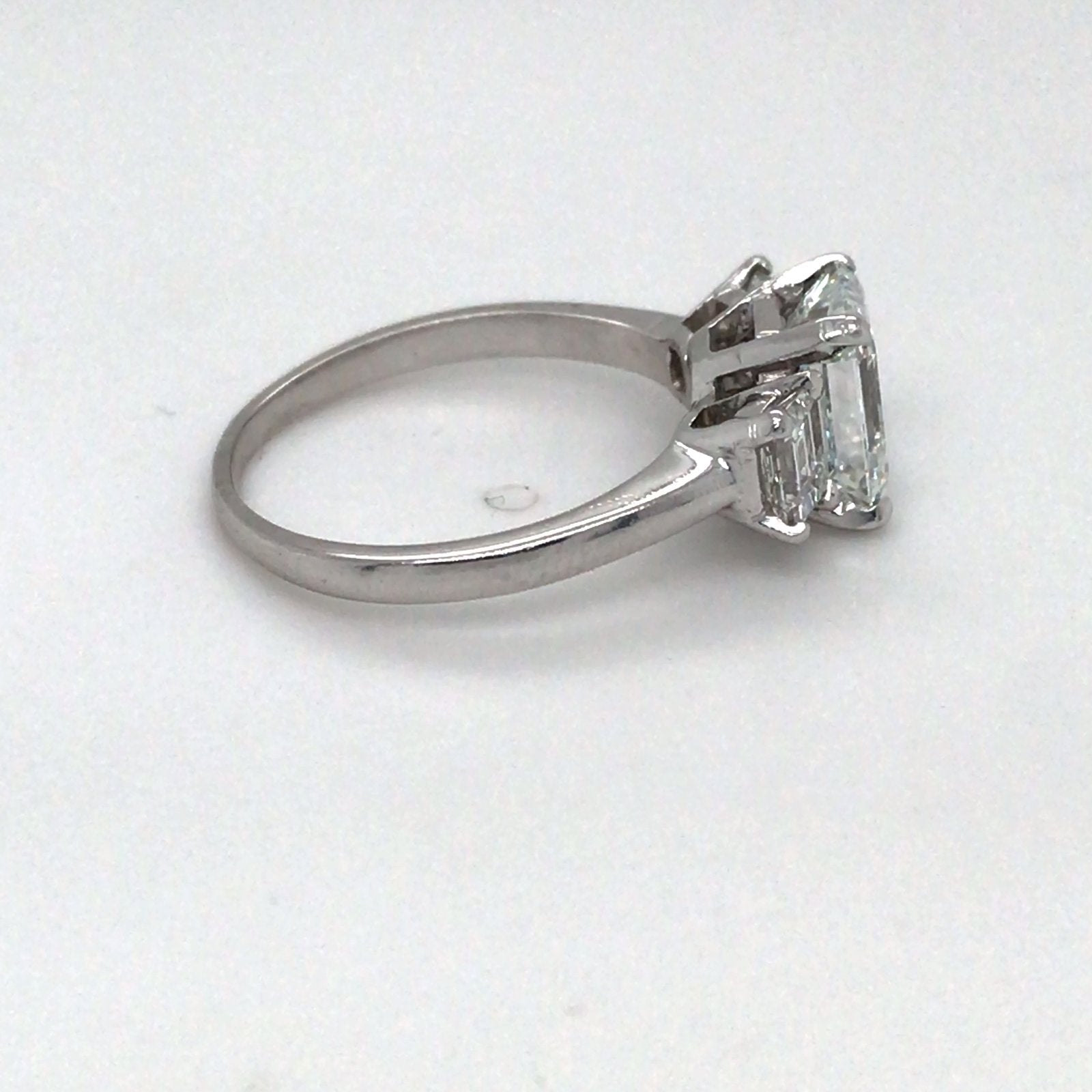 PLAT 2.67CTW EMERALD CUT THREE STONE DIAMOND ENGAGEMENT RING