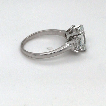 PLAT 2.67CTW EMERALD CUT THREE STONE DIAMOND ENGAGEMENT RING
