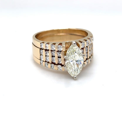 14KY 2.53CTW MARQUISE-RBC DIAMOND ENGAGEMENT RING