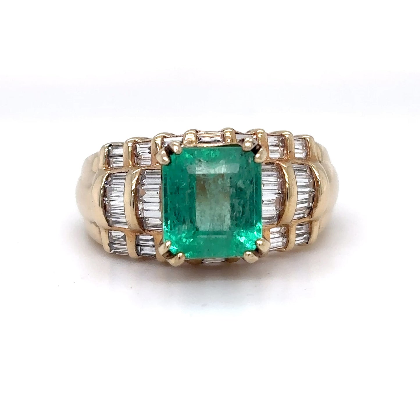 14KY 3.95CTW EMERALD-BAGUETTE DIAMOND RING