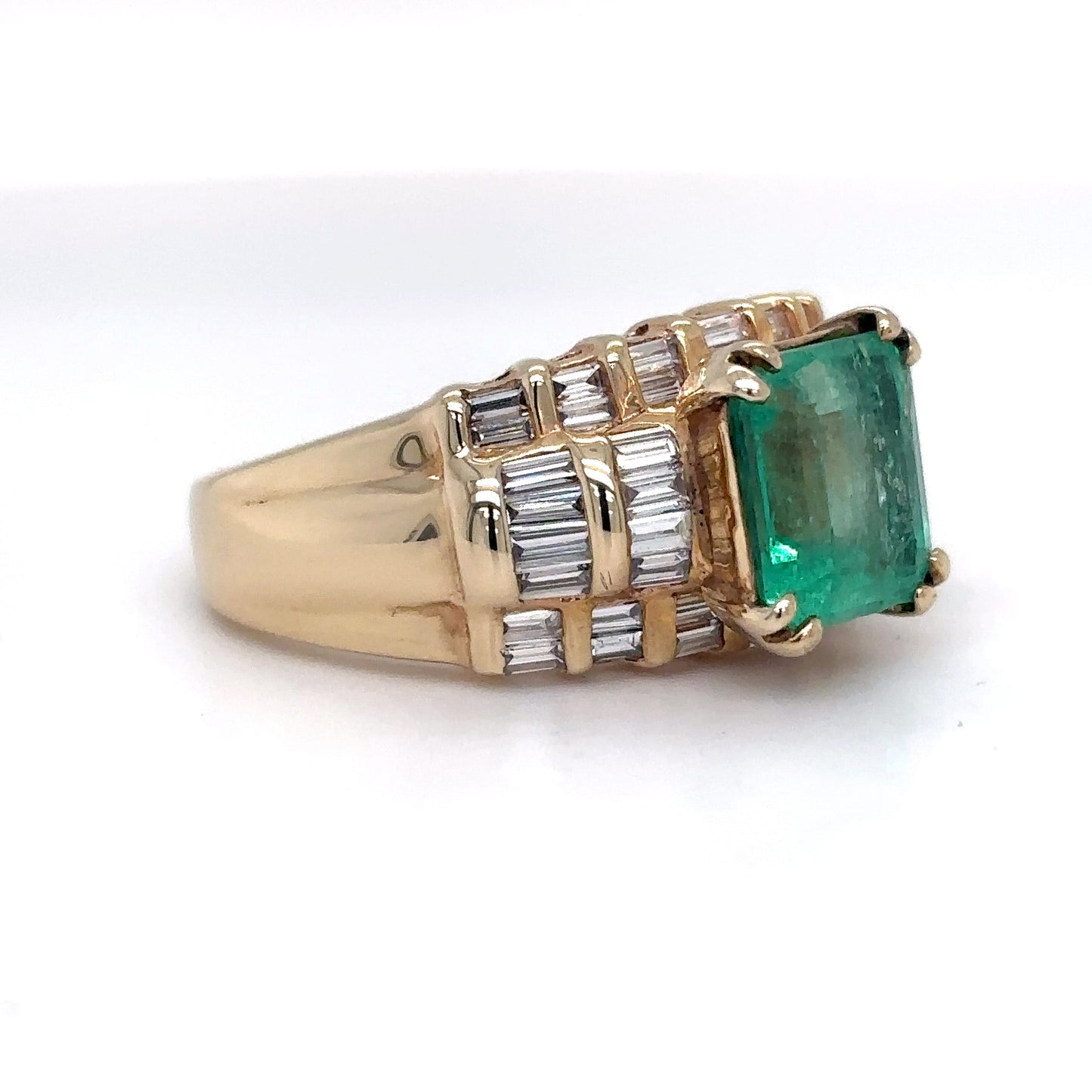 14KY 3.95CTW EMERALD-BAGUETTE DIAMOND RING