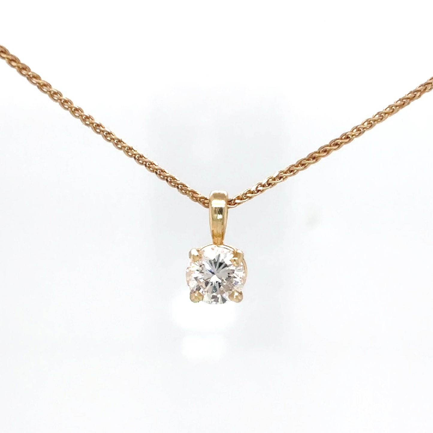 14KY 0.62CT ROUND DIAMOND SOLITAIRE PENDANT I1/H