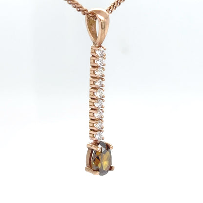 14KR 0.77CTW PEAR CHOCOLATE-WHITE DIAMOND PENDANT SI/C-7 SI1/F-G