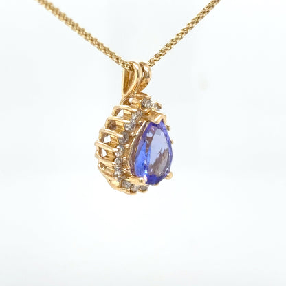 14KY 1.60CTW TANZANITE-DIAMOND HALO PENDANT "A" SI2/H 2.8G