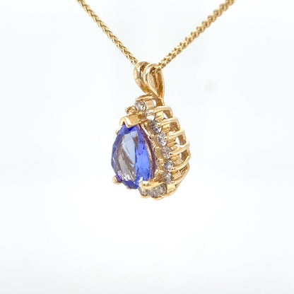 14KY 1.60CTW TANZANITE-DIAMOND HALO PENDANT "A" SI2/H 2.8G