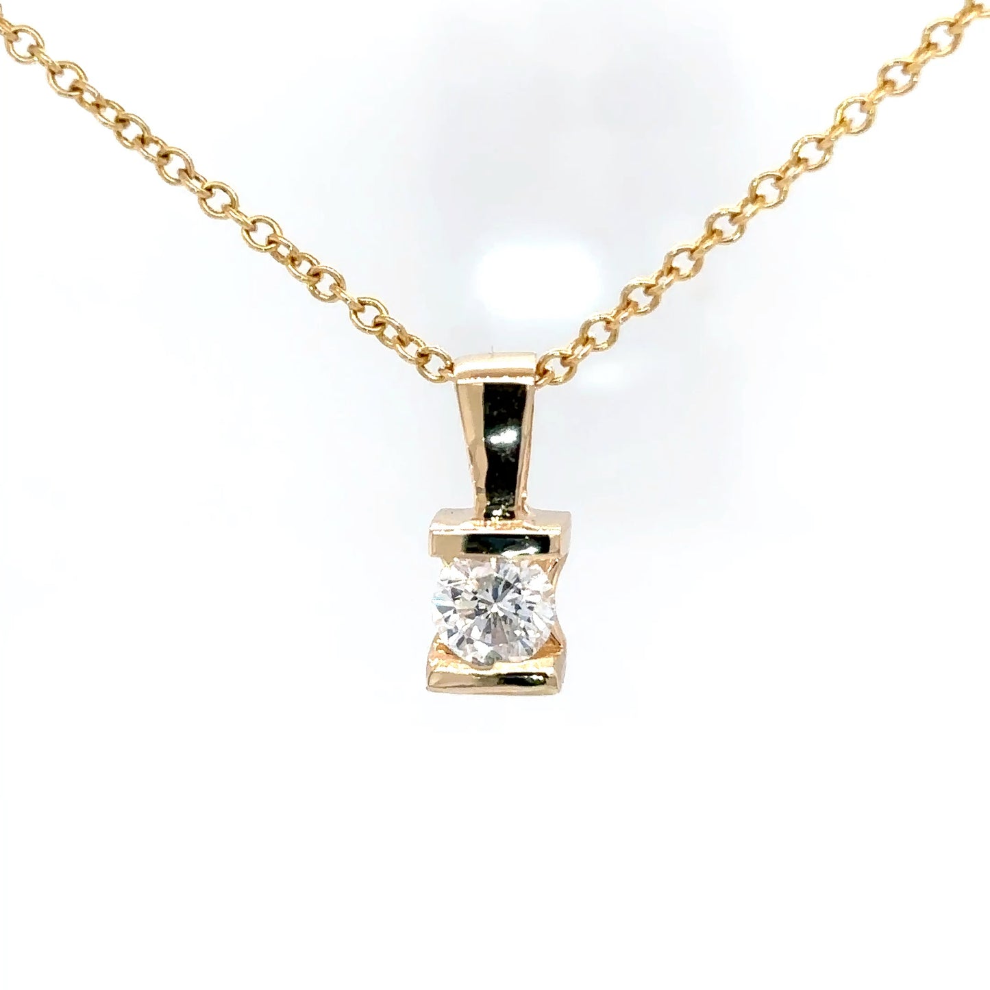 14KY 0.56CT ROUND BRILLIANT TENSION SET PENDANT I1/H-I 1.7G