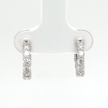 Diamond hoop earrings on a white background