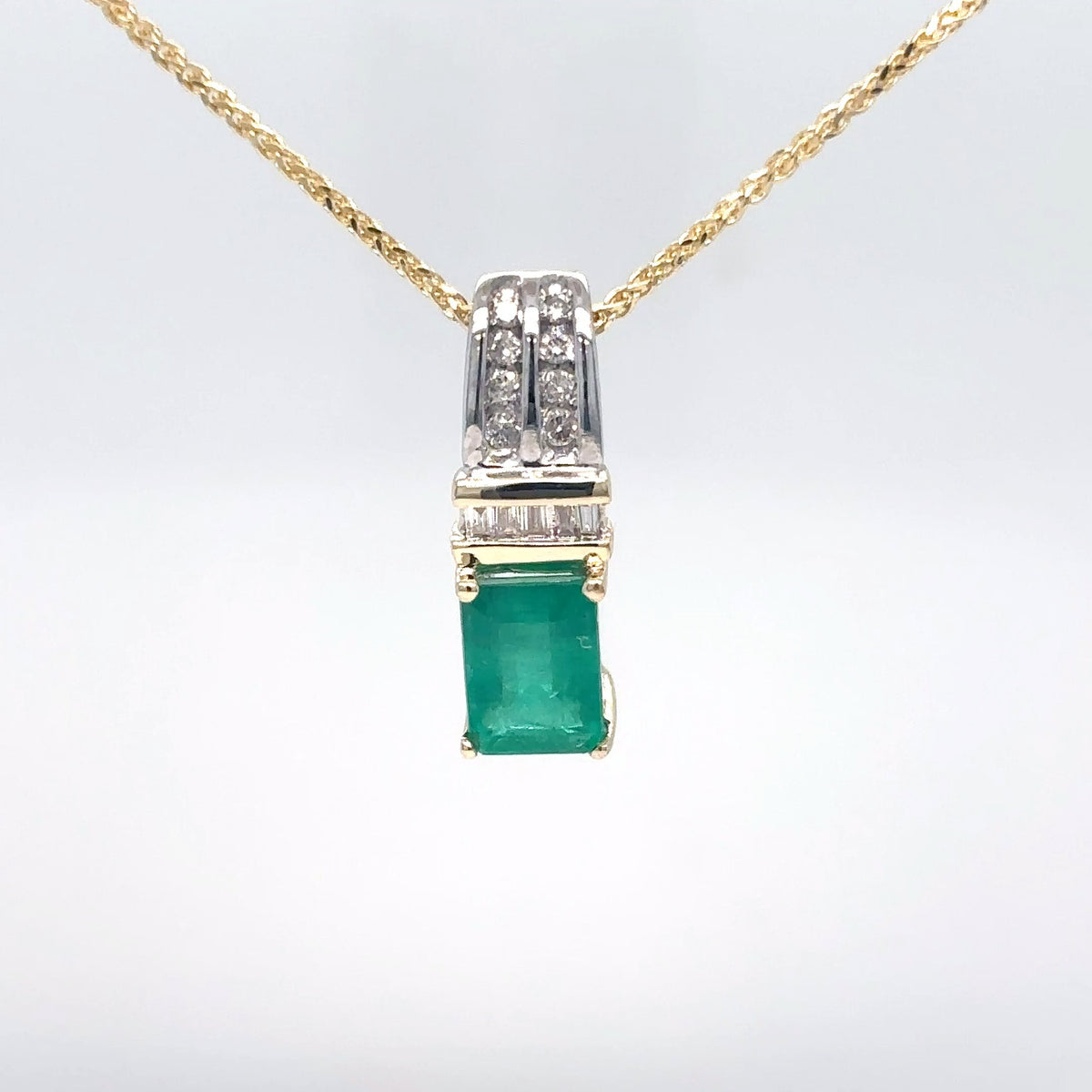 14KTT 1.32CTW EMERALD-DIAMOND PENDANT "AA" SI/H 1.6G