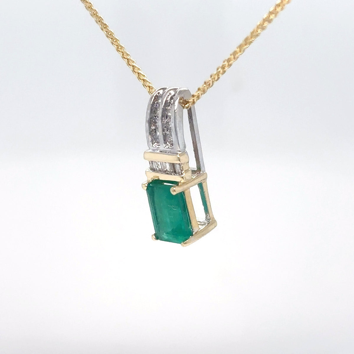 14KTT 1.32CTW EMERALD-DIAMOND PENDANT "AA" SI/H 1.6G