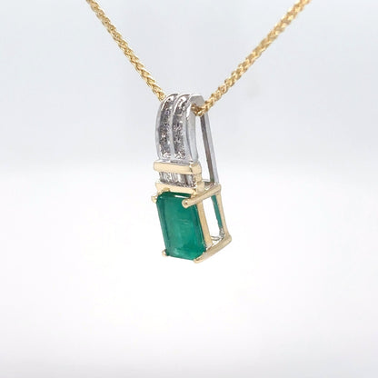 14KTT 1.32CTW EMERALD-DIAMOND PENDANT "AA" SI/H 1.6G