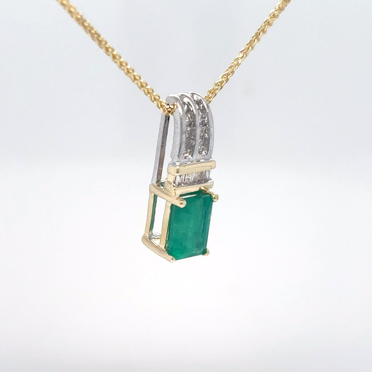 14KTT 1.32CTW EMERALD-DIAMOND PENDANT "AA" SI/H 1.6G