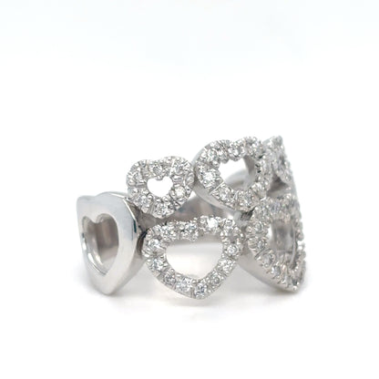 Silver heart-shaped earring with clear stones on a white background