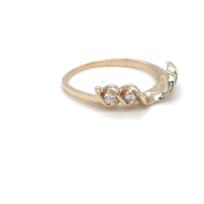 14KY 0.08CTW ROUND DIAMOND WRAP RING SI2/H 2.3G