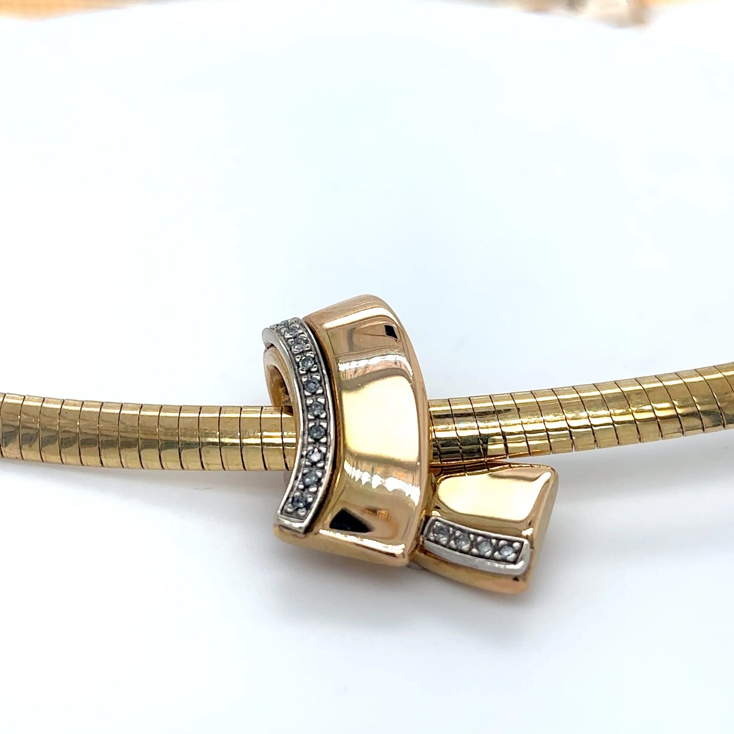 14KY 0.10CTW DIAMOND RIBBON SLIDE I1/G-H 3.1G