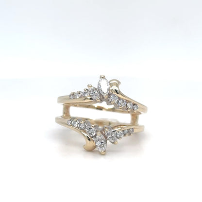 Gold ring with diamond accents on a white background