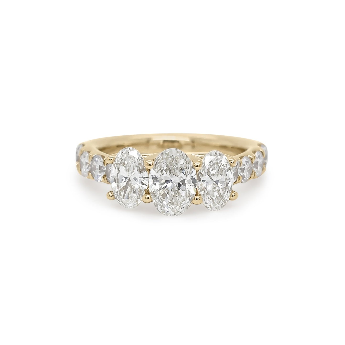 14KY 2.29CTW THREE OVAL-ROUND DIAMOND RING VS1/H-K 5.4G