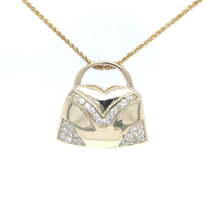 14KY .30CTW DIAMOND HANDBAG PENDANT SI/G-H