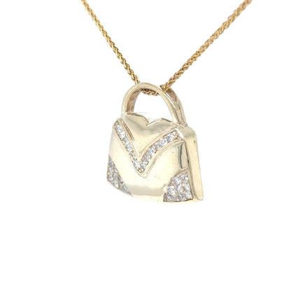 14KY .30CTW DIAMOND HANDBAG PENDANT SI/G-H