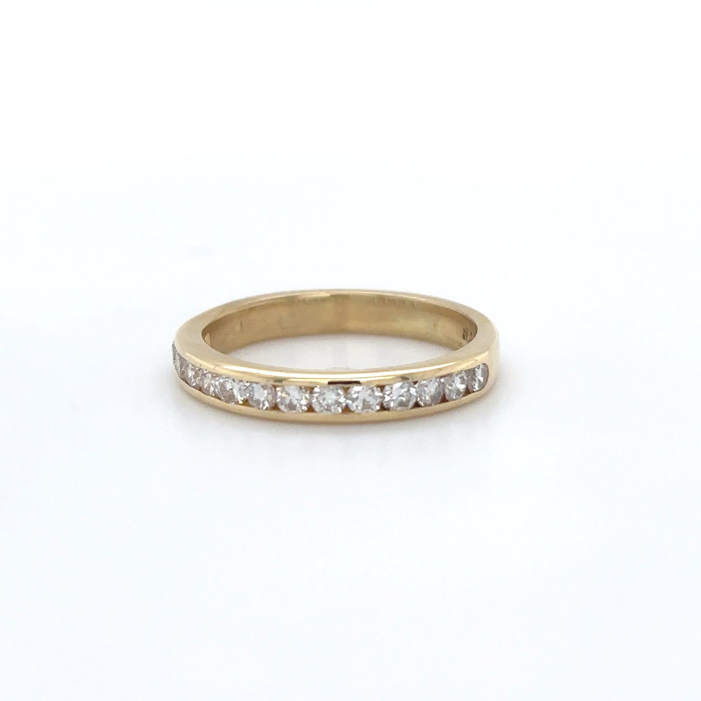 18KY 0.41CTW ROUND BRILLIANT CHANNEL SET BAND VS/G 2.7G