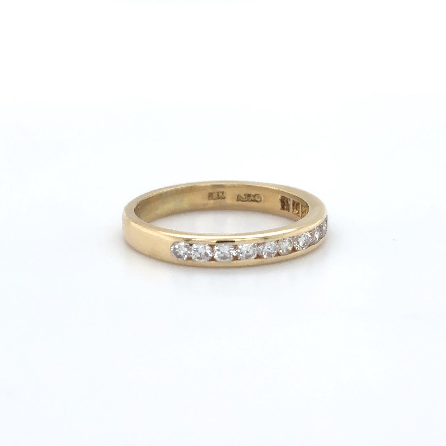 18KY 0.41CTW ROUND BRILLIANT CHANNEL SET BAND VS/G 2.7G