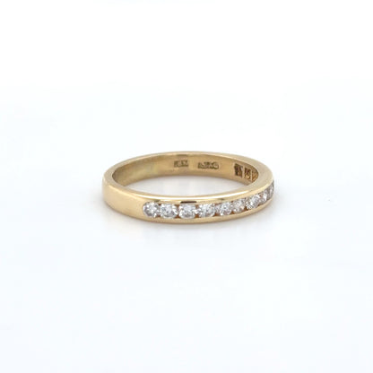 18KY 0.41CTW ROUND BRILLIANT CHANNEL SET BAND VS/G 2.7G